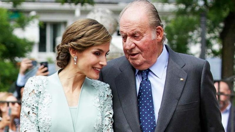 Juan Carlos con la Reina