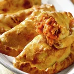 Prepara estas empanadas de pollo en freidora de aire, una opción saludable y deliciosa